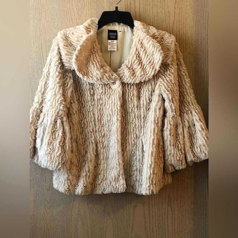 Jacket SHARON YOUNG.  Faux fur coat with flared sleeves